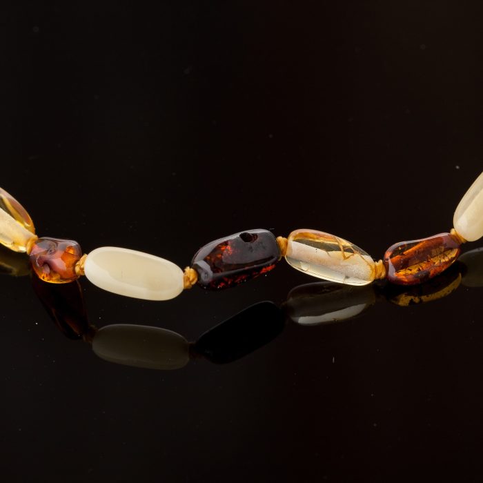 DS_0103-min Amber Baby Teething Necklace - Olive Shape Beads BN010 - Image 2