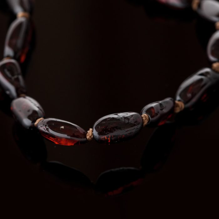 DS_0115-min Amber Baby Teething Necklace - Olive Shape Beads BN008 - Image 2